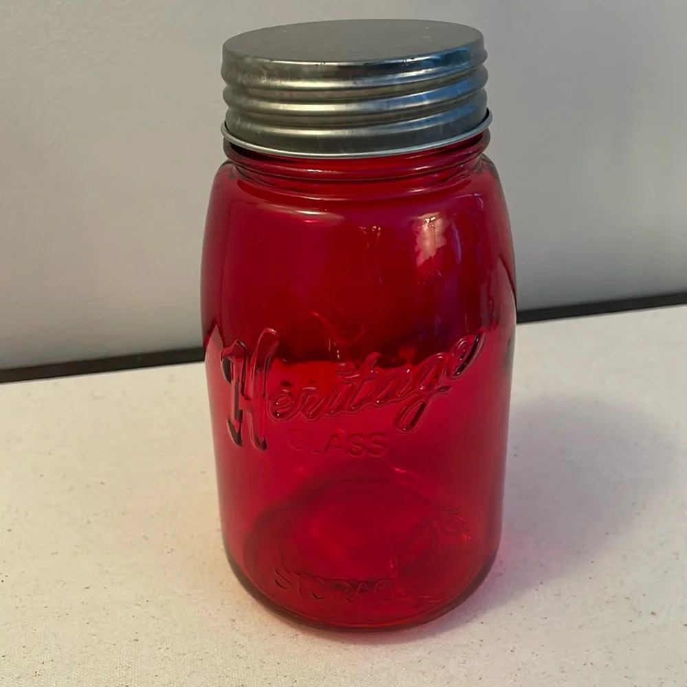 Red Decorative Jar with Lights on inside .